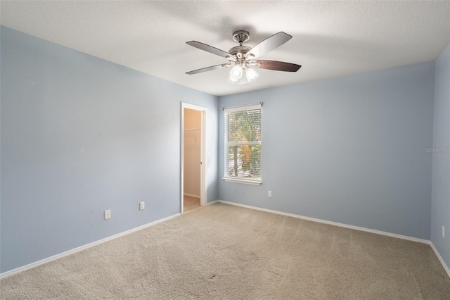 356 Giovani Blvd, Clermont, FL 34715 - carpeted spare room featuring ceiling fan and a textured ceiling