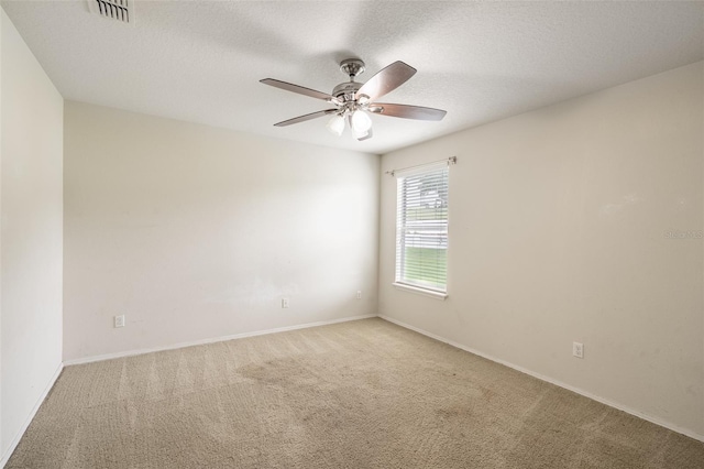 356 Giovani Blvd, Clermont, FL 34715 - empty room featuring light colored carpet and ceiling fan