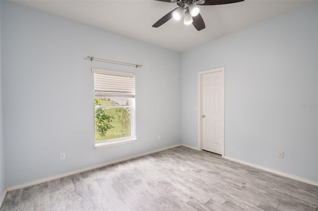 356 Giovani Blvd, Clermont, FL 34715 - spare room featuring wood finished floors and ceiling fan