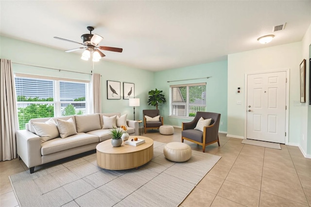 356 Giovani Blvd, Clermont, FL 34715 - living room with light tile patterned floors and a ceiling fan