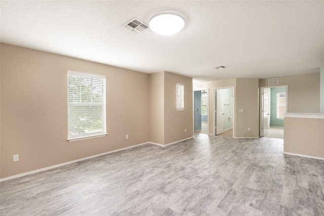 356 Giovani Blvd, Clermont, FL 34715 - empty room with light wood finished floors