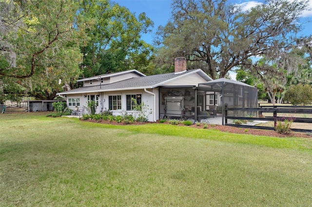 43411 State Road 19, Altoona, FL 32702 - rear view of property featuring a chimney and glass enclosure