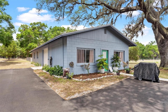 43411 State Road 19, Altoona, FL 32702 - view of side of property with concrete block siding and asphalt driveway
