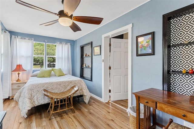 43411 State Road 19, Altoona, FL 32702 - bedroom featuring light wood-type flooring, baseboards, and a ceiling fan