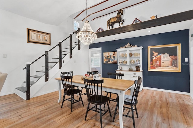 43411 State Road 19, Altoona, FL 32702 - dining room featuring stairs, a chandelier, light wood finished floors, and baseboards