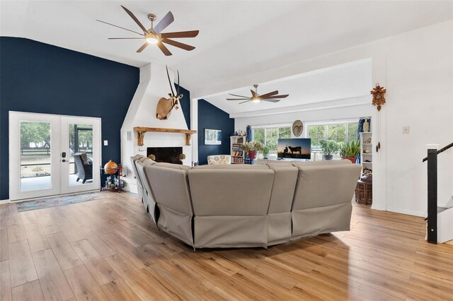 43411 State Road 19, Altoona, FL 32702 - living area with vaulted ceiling, ceiling fan, light wood finished floors, and french doors