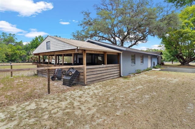 43411 State Road 19, Altoona, FL 32702 - rear view of property with an exterior structure and an outbuilding