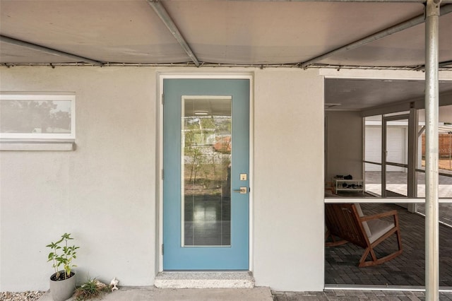 4125 Worcester Rd, Sarasota, FL 34231 - entrance to property featuring stucco siding