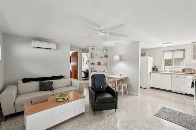 4125 Worcester Rd, Sarasota, FL 34231 - living area featuring an AC wall unit, ceiling fan, dark aggregate flooring, and baseboards