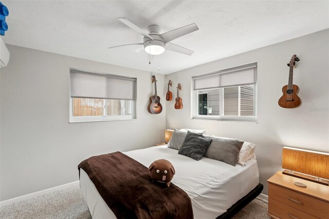 4125 Worcester Rd, Sarasota, FL 34231 - carpeted bedroom with baseboards and ceiling fan