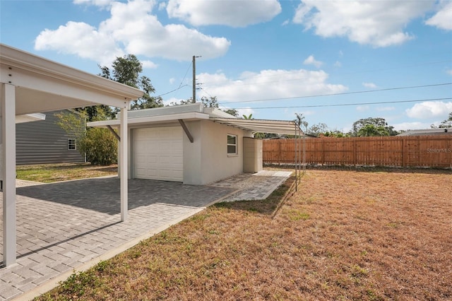 4125 Worcester Rd, Sarasota, FL 34231 - view of yard featuring an outbuilding and a detached garage