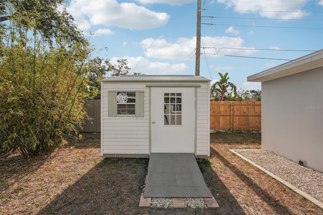 4125 Worcester Rd, Sarasota, FL 34231 - view of shed with a fenced backyard