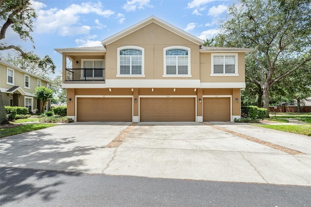 866 Ashworth Overlook Dr Unit B, Apopka, FL 32712 - multi unit property featuring stucco siding, driveway, and a garage