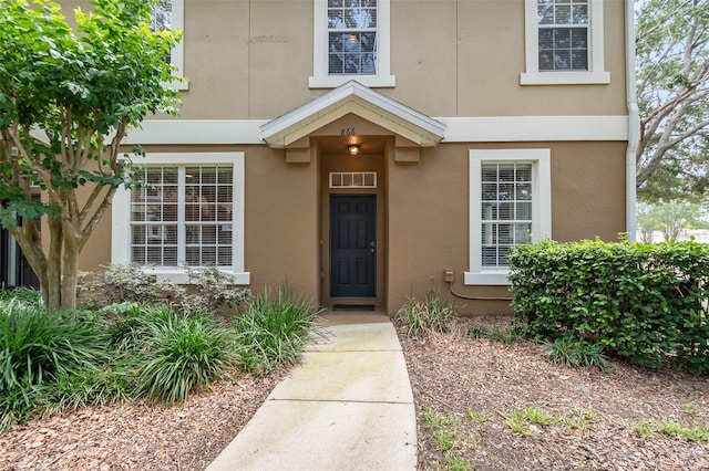 866 Ashworth Overlook Dr Unit B, Apopka, FL 32712 - property entrance featuring stucco siding