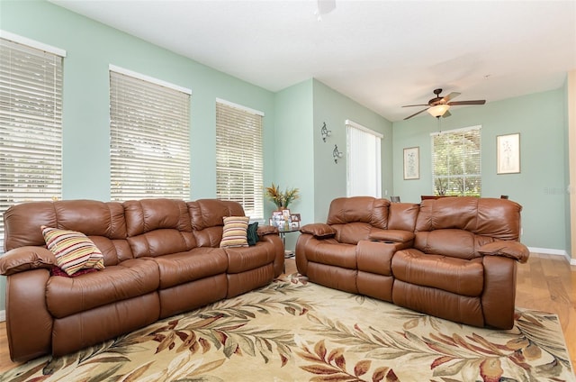 866 Ashworth Overlook Dr Unit B, Apopka, FL 32712 - living room featuring light wood finished floors, ceiling fan, and baseboards