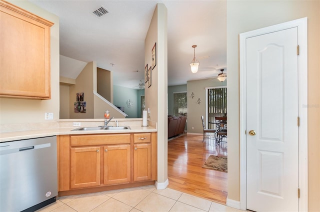 866 Ashworth Overlook Dr Unit B, Apopka, FL 32712 - kitchen with stainless steel dishwasher, ceiling fan, light tile patterned flooring, light countertops, and a sink