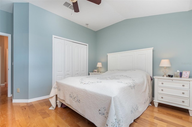 866 Ashworth Overlook Dr Unit B, Apopka, FL 32712 - bedroom with a closet, light wood-type flooring, vaulted ceiling, baseboards, and a ceiling fan