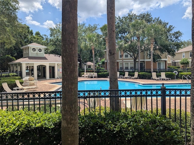 866 Ashworth Overlook Dr Unit B, Apopka, FL 32712 - community pool featuring fence and a patio