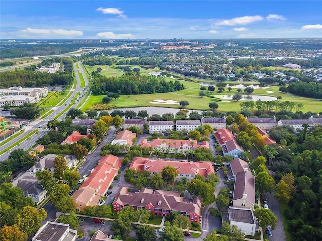aerial view featuring a water view, golf course view, and a residential view