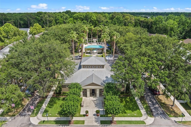 1021 Siena Park Blvd Unit 204, Kissimmee, FL 34747 - view of subject property featuring a pool and a heavily wooded area