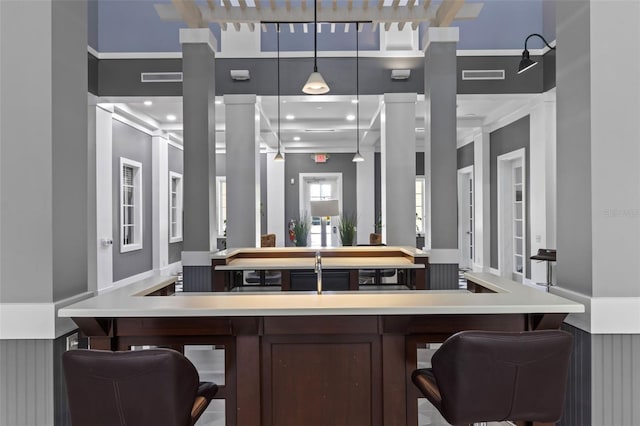 1021 Siena Park Blvd Unit 204, Kissimmee, FL 34747 - bar with decorative columns and a sink