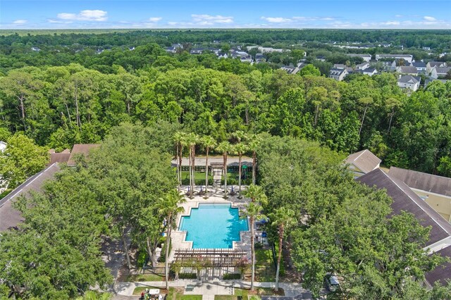1021 Siena Park Blvd Unit 204, Kissimmee, FL 34747 - bird's eye view of a pool and a forest