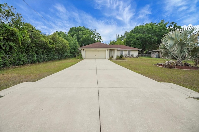 ranch-style home featuring an attached garage and driveway