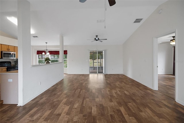 unfurnished living room featuring ceiling fan, dark wood finished floors, vaulted ceiling, and baseboards