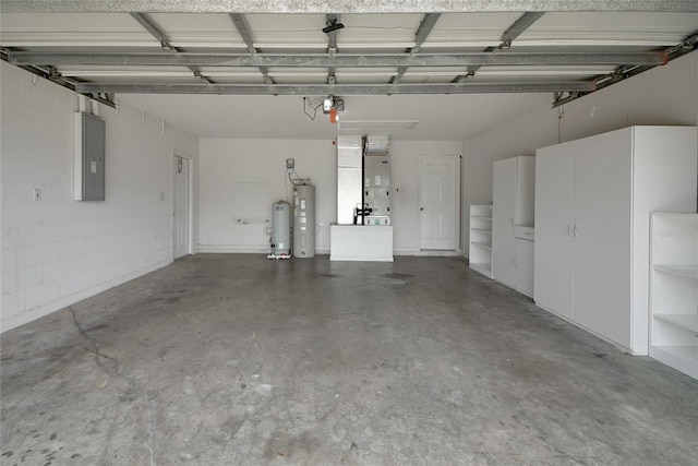 garage featuring electric water heater, electric panel, heating unit, and a garage door opener