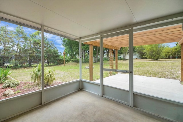 unfurnished sunroom with healthy amount of natural light