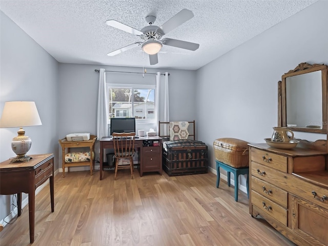 17819 SE 105th Ct, Summerfield, FL 34491 - office featuring light wood-style floors, ceiling fan, a textured ceiling, and baseboards