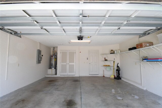 2120 Willow Grove Way, The Villages, FL 32162 - garage with water heater, electric panel, and a garage door opener