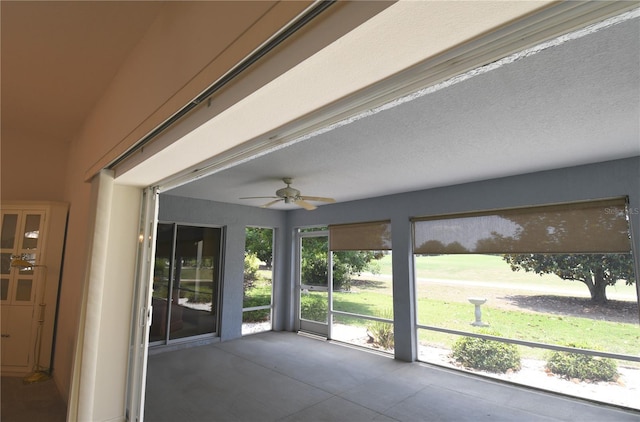 2120 Willow Grove Way, The Villages, FL 32162 - unfurnished sunroom with a ceiling fan