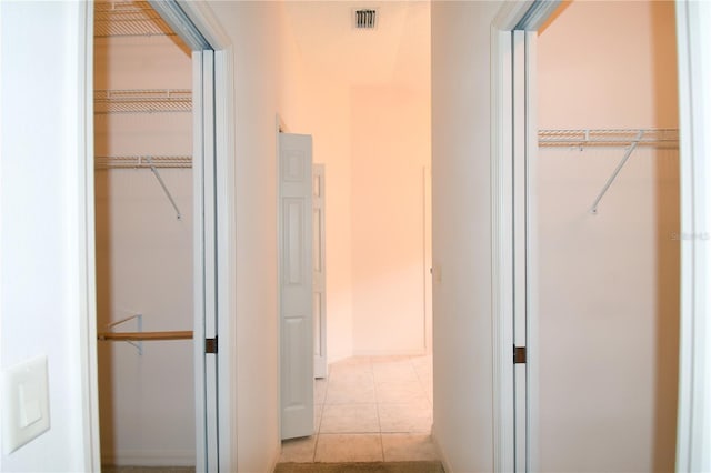 2120 Willow Grove Way, The Villages, FL 32162 - hallway with light tile patterned floors