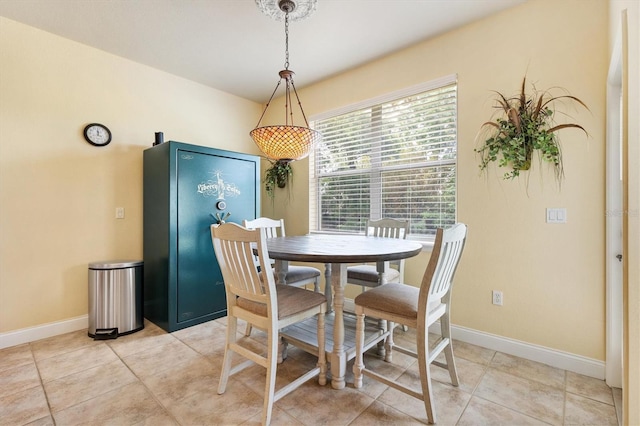 10465 SE 41st Ter, Belleview, FL 34420 - dining room with baseboards and light tile patterned flooring