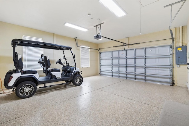 10465 SE 41st Ter, Belleview, FL 34420 - garage featuring electric panel and a garage door opener