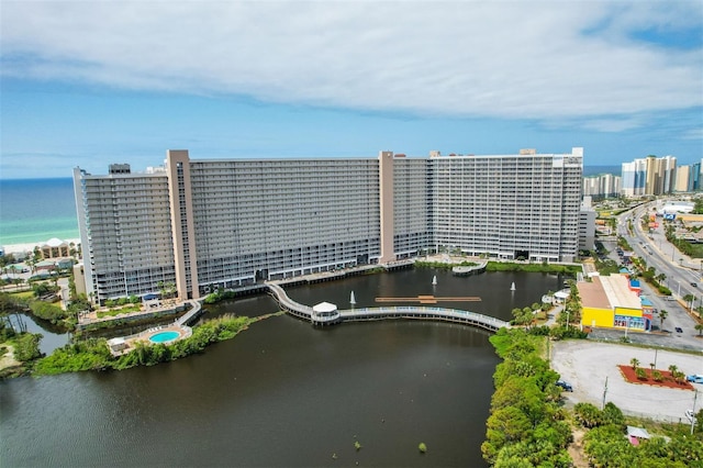 view of urban area featuring a large body of water