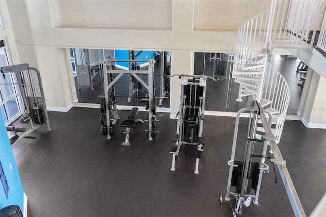 exercise room with baseboards