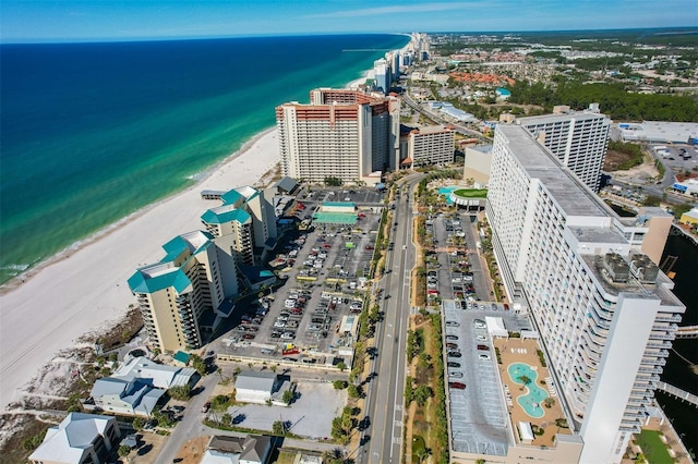 view of property location with unending shoreline and nearby urban area