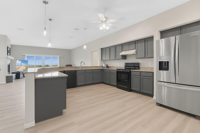 12512 Lake Ridge Cir, Clermont, FL 34711 - kitchen with black appliances, under cabinet range hood, gray cabinetry, a peninsula, and light wood-type flooring