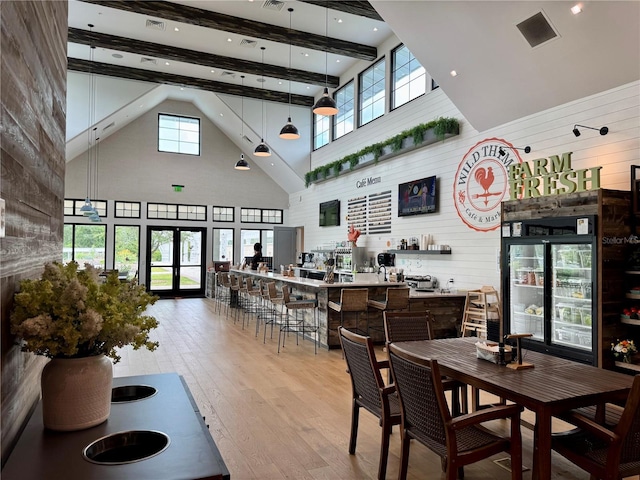17677 Nectar Flume Dr, Land O Lakes, FL 34637 - dining area featuring high vaulted ceiling, wood-type flooring, and beam ceiling