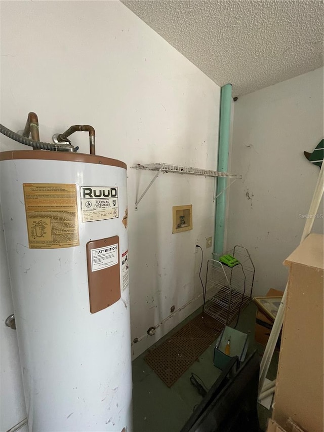 2421 Centennial Blvd, Leesburg, FL 34748 - washroom with electric water heater and a textured ceiling