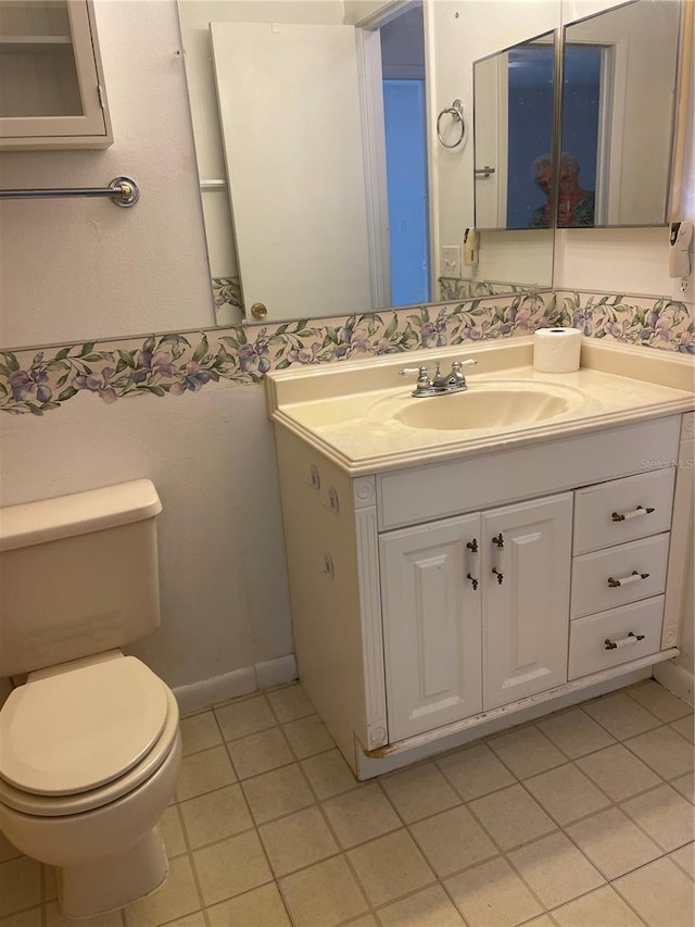 2421 Centennial Blvd, Leesburg, FL 34748 - half bath with tile patterned flooring, toilet, and vanity