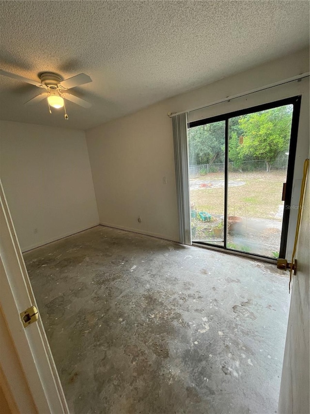 2421 Centennial Blvd, Leesburg, FL 34748 - empty room with a textured ceiling and ceiling fan
