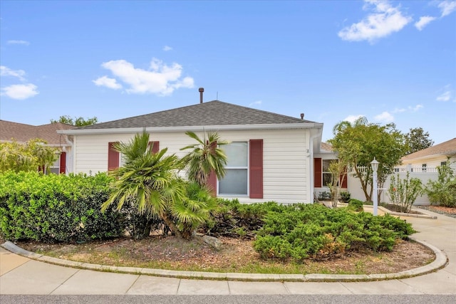 8932 SE 168th Sedgwick Pl, The Villages, FL 32162 - view of front of house featuring a shingled roof