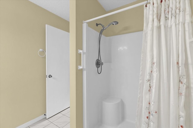 8932 SE 168th Sedgwick Pl, The Villages, FL 32162 - bathroom featuring curtained shower and tile patterned floors