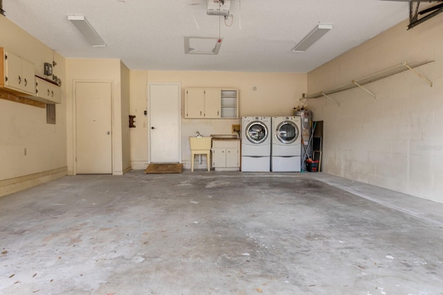 8738 SW 95th Ln Unit B, Ocala, FL 34481 - garage featuring separate washer and dryer, electric water heater, a garage door opener, and concrete block wall