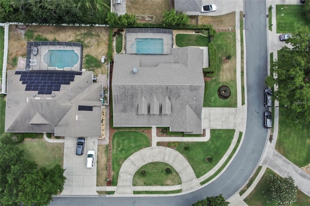 aerial overview of property's location with a pool area