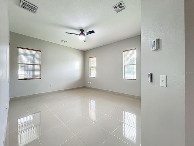 3731 Peaceful Valley Dr, Clermont, FL 34711 - empty room featuring light tile patterned floors and ceiling fan