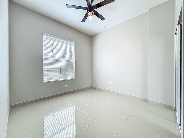 3731 Peaceful Valley Dr, Clermont, FL 34711 - empty room featuring light tile patterned floors and ceiling fan